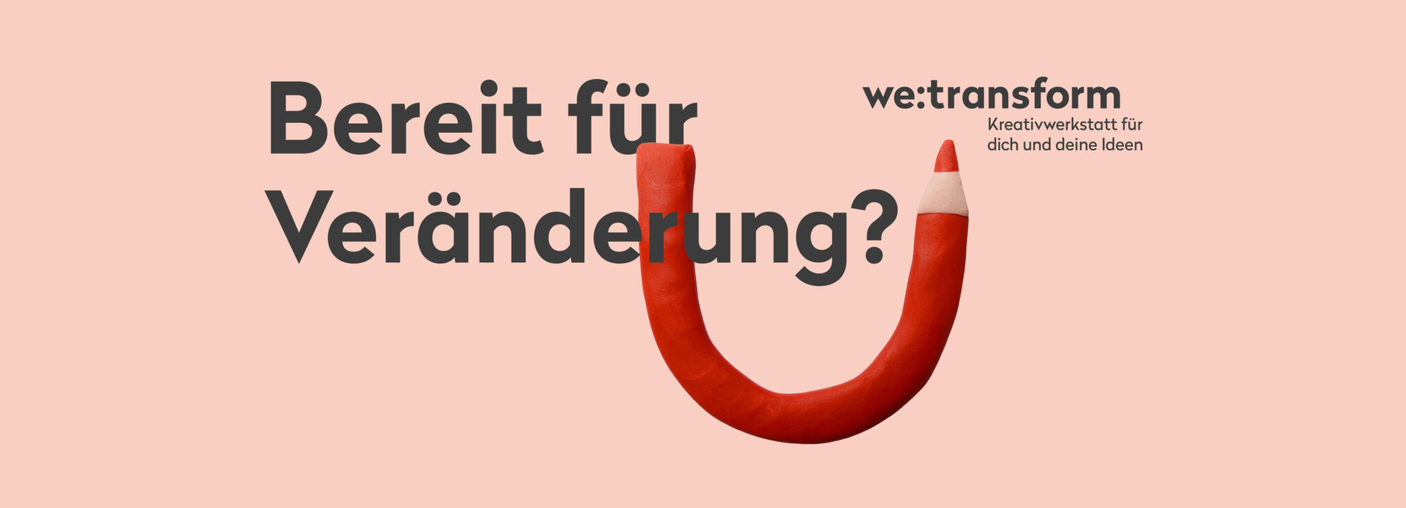 Text in Deutsch Bereit für Veränderung? mit einem roten U-förmigen Stift, und we:transform Kreativwerkstatt für dich und deine Ideen auf hellem Hintergrund.